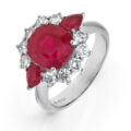 Anello in oro bianco con rubino taglio ovale  (3.92 ct), rubini taglio goccia (0,60 ct) e diamanti taglio brillante (0,76 ct)