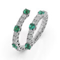 Anello 2 giri in oro bianco con diamanti (ct 0,55) e smeraldi (ct 0,44)