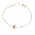 Bracciale in oro rosa con bimbo e diamantino punto luce (ct 0,03)