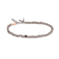 Bracciale uomo con sassi piccoli in titanio e oro rosso e sasso con diamanti neri