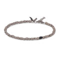 Bracciale uomo con sassi piccoli in titanio e un sasso smaltato nero